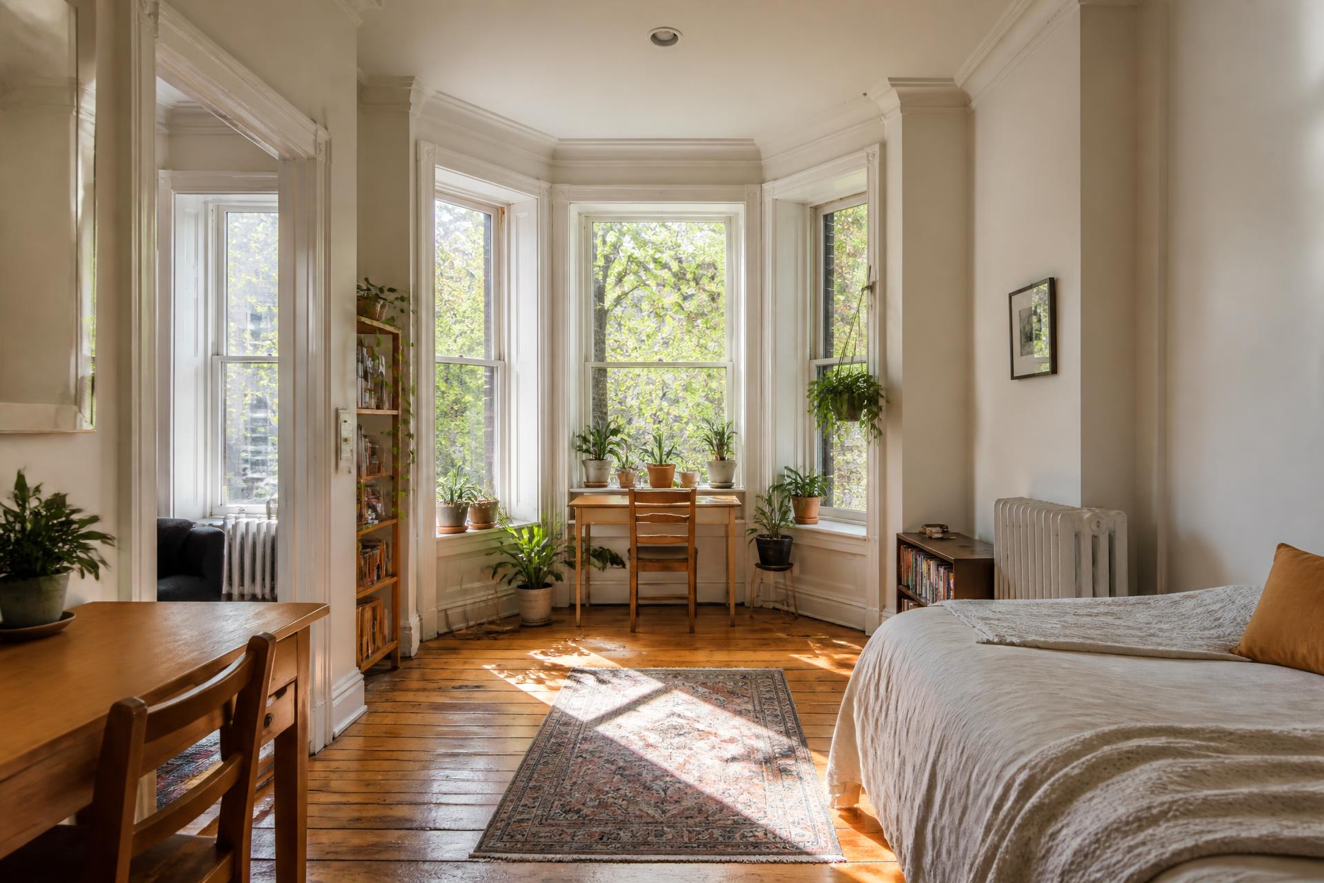 Bright furnished bedroom in a Philadelphia rowhouse